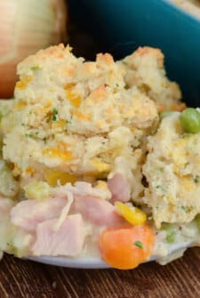 Turkey Biscuit Casserole - save your leftover turkey from Thanksgiving and make this comforting casserole! It is filled with turkey and veggies in a creamy white gravy, then topped with gorgeous gluten free chive and cheese biscuits!