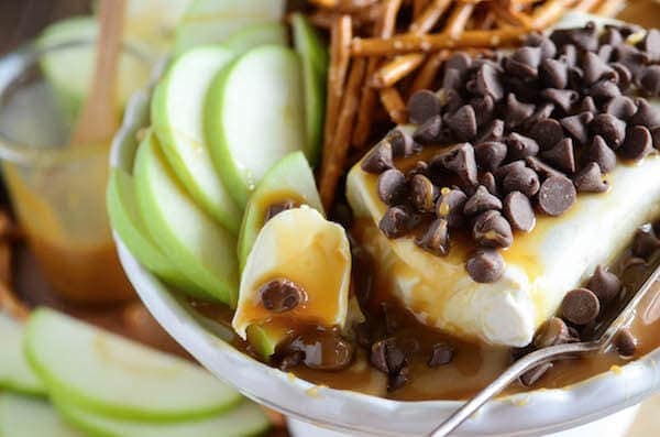 Warm Caramel Apple Dip! Only 4 ingredients to make this delicious sweet dip that will remind you of a chocolate caramel apple.