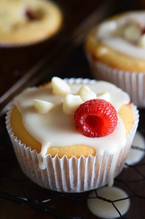 White Chocolate Raspberry Muffins - these easy one bowl muffins are filled with fresh raspberries, white chocolate chips and a hint of orange zest!