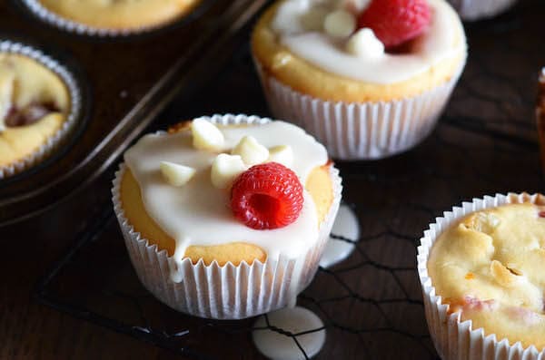 White Chocolate Raspberry Muffins - these easy one bowl muffins are filled with fresh raspberries, white chocolate chips and a hint of orange zest!