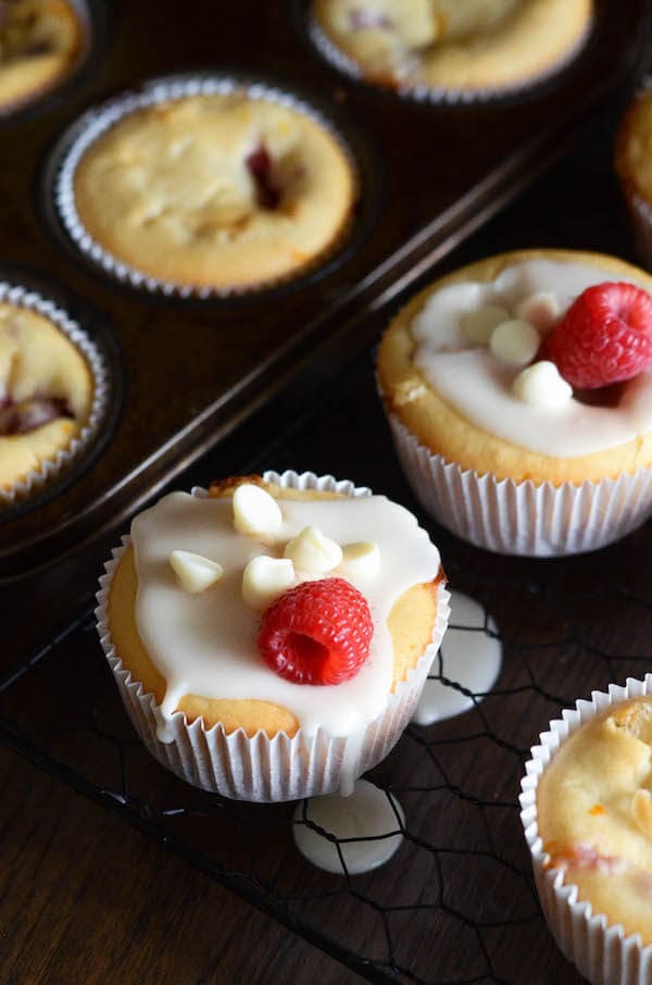 White Chocolate Raspberry Muffins - these easy one bowl muffins are filled with fresh raspberries, white chocolate chips and a hint of orange zest!