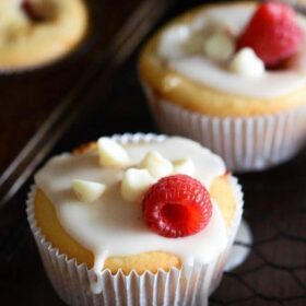 White Chocolate Raspberry Muffins - these easy one bowl muffins are filled with fresh raspberries, white chocolate chips and a hint of orange zest!