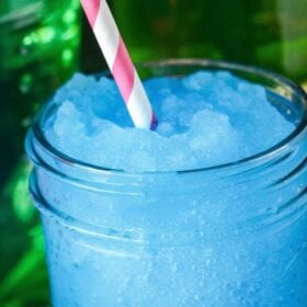 Boozy Jolly Rancher Slushies! You only need 4 ingredients for these awesome summer cocktails: jolly ranchers, vodka, ice and sprite!
