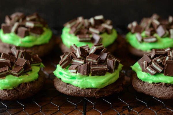 ANDES MINT COOKIES: soft dark chocolate cookies are frosted with mint buttercream frosting and topped with Andes Mints to create the best mint cookie, ever!