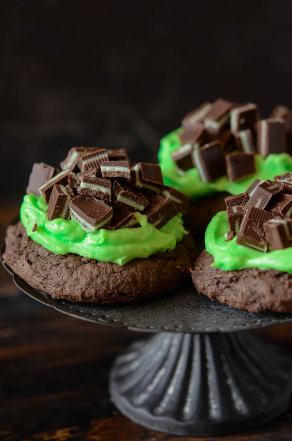 ANDES MINT COOKIES: soft dark chocolate cookies are frosted with mint buttercream frosting and topped with Andes Mints to create the best mint cookie, ever!