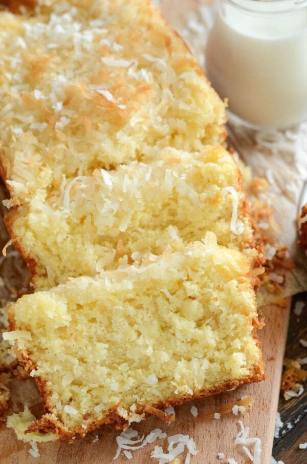 Pineapple Coconut Quick Bread: this sweet tropical quick bread is full of flaky coconut, bites of pineapple, and it can be served for breakfast or dessert!