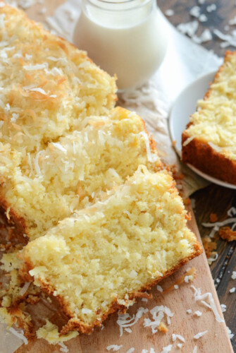Pineapple Coconut Quick Bread: this sweet tropical quick bread is full of flaky coconut, bites of pineapple, and it can be served for breakfast or dessert!