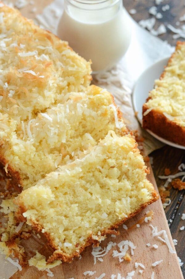 Pineapple Coconut Quick Bread: this sweet tropical quick bread is full of flaky coconut, bites of pineapple, and it can be served for breakfast or dessert!