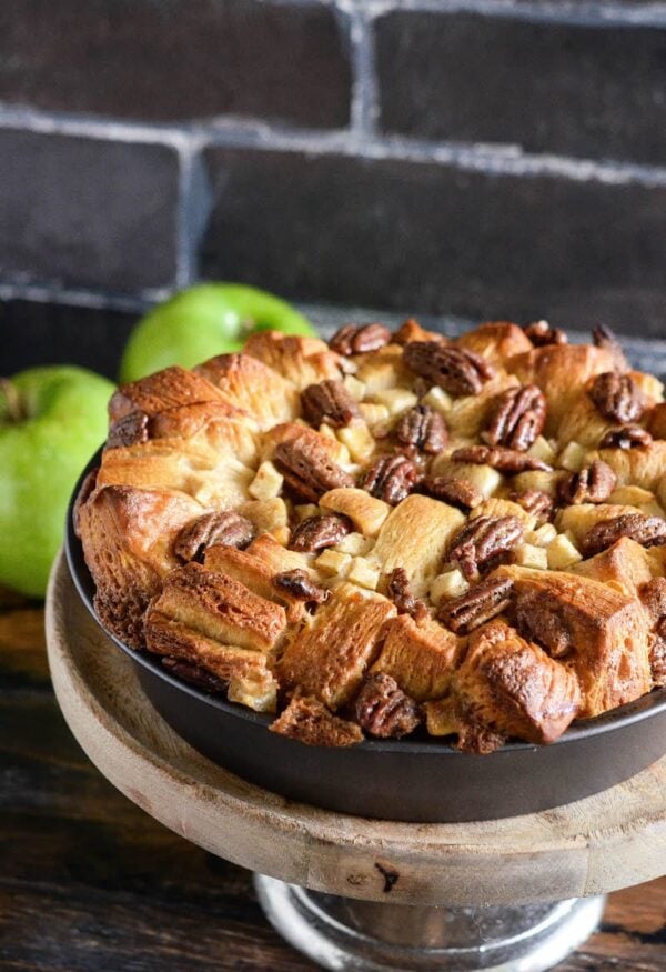 Country Apple Coffee Cake: apples, pecans, cinnamon, brown sugar, flaky biscuits and a little whiskey combine to make a gorgeous twist on your favorite coffee cake!