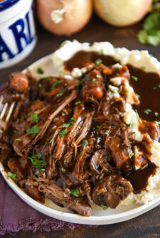 Slow Cooker Beef Pot Roast: a favorite family recipe for an extra flavorful tender beef pot roast that is always an instant favorite! You will never guess the secret ingredients! #SlowCooker #CrockPot #PotRoast