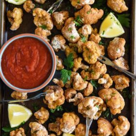 Old Bay Crispy Cauliflower Cocktail: a vegetarian twist on the classic shrimp cocktail featuring sheet pan crispy baked cauliflower!