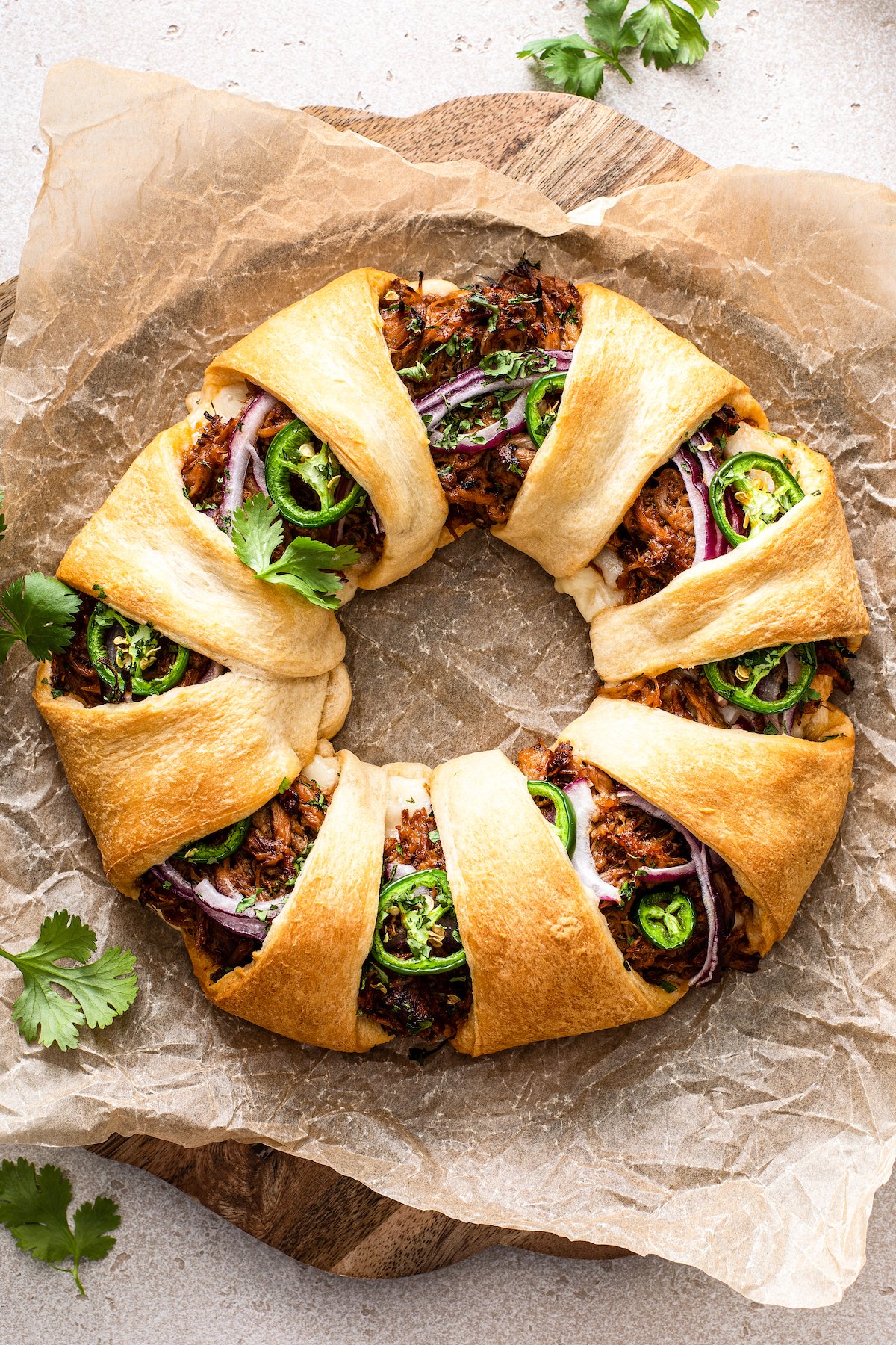 https://thenovicechefblog.com/wp-content/uploads/2018/03/Pulled-Pork-Crescent-Ring-1.jpeg