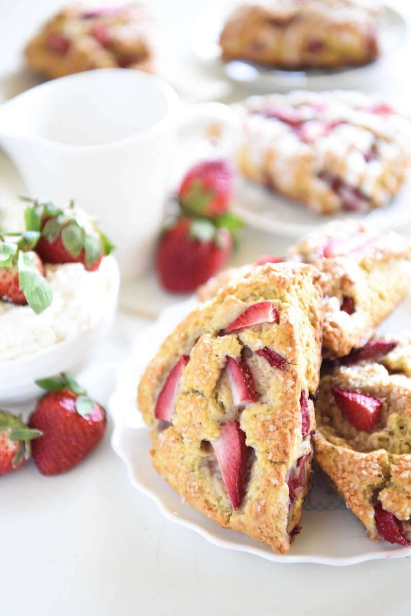 Strawberry Shortcake Scones: tender scones are stuffed with fresh strawberries, topped with vanilla cream icing and are easily made with your food processor! 