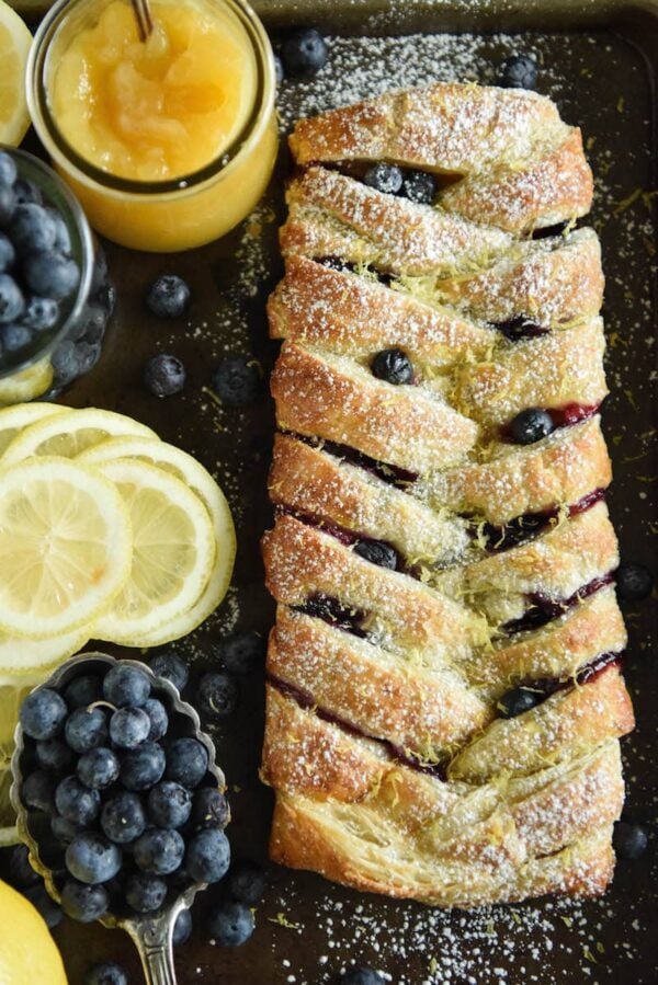 This flaky Blueberry Lemon Braid is filled with cream cheese, lemon curd and blueberries to create an amazing dessert. It is also perfect with coffee for breakfast.