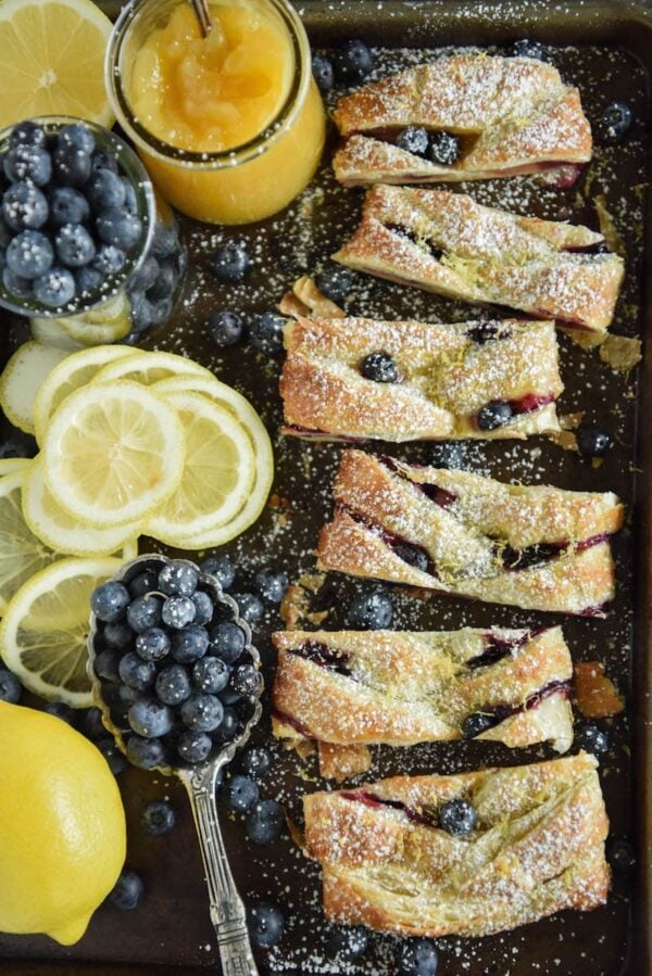 This flaky Blueberry Lemon Braid is filled with cream cheese, lemon curd and blueberries to create an amazing dessert. It is also perfect with coffee for breakfast.