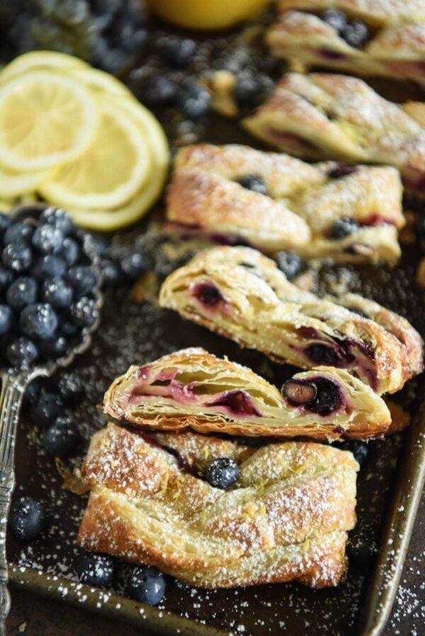 This flaky Blueberry Lemon Braid is filled with cream cheese, lemon curd and blueberries to create an amazing dessert. It is also perfect with coffee for breakfast.