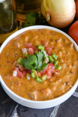Cheesy Taco Beer Dip: this from scratch dip is super easy to make and full of flavor! #CincoDeMayo #Cheese