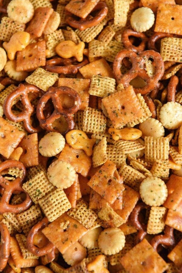 Cheesy Ranch Chex Mix: loaded with tons of flavor and cheesy crunchy goodness, this snack mix is the new ultimate tailgating party snack that will leave everyone begging for more! #ChexMix #Tailgating #SnackMix