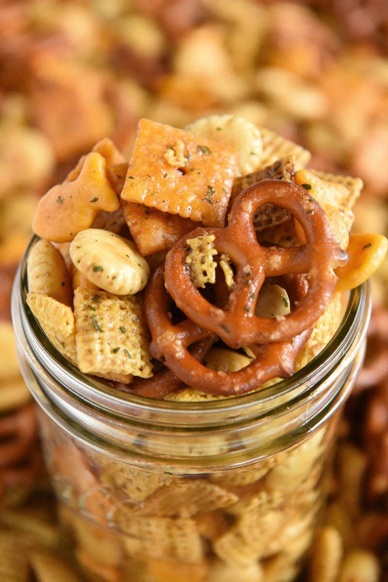 Cheesy Ranch Chex Mix: loaded with tons of flavor and cheesy crunchy goodness, this snack mix is the new ultimate tailgating party snack that will leave everyone begging for more! #ChexMix #Tailgating #SnackMix