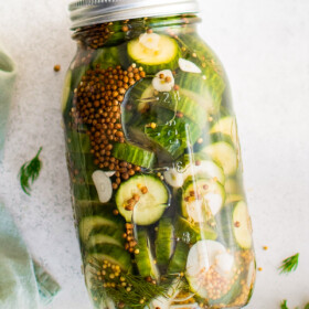 Refrigerator pickles in a mason jar.