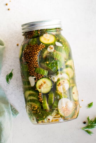 Refrigerator pickles in a mason jar.