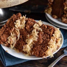 Disney's German Chocolate Cake: this famous throwback recipe, for a soft chocolate cake with coconut pecan frosting, was served at Disney World in the 1970’s! #Chocolate #Cake #Disney #WaltDisneyWorld