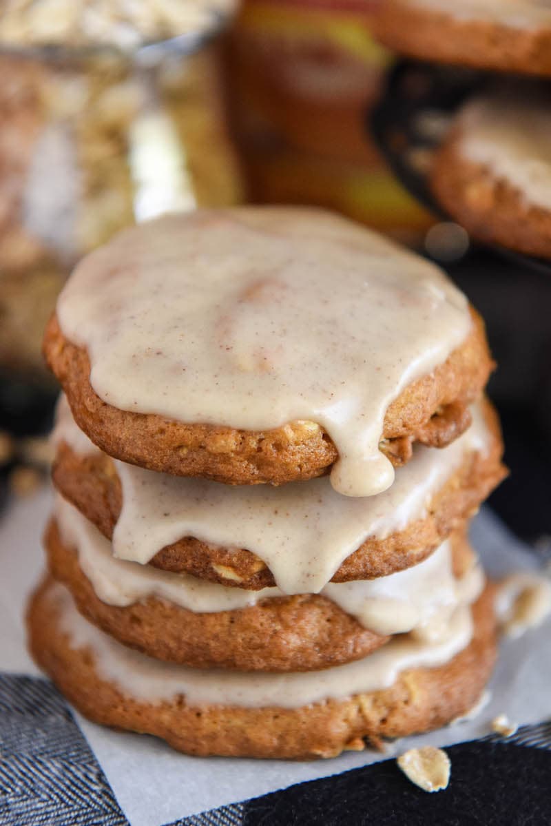 A stack of iced pumpkin oatmeal cookies