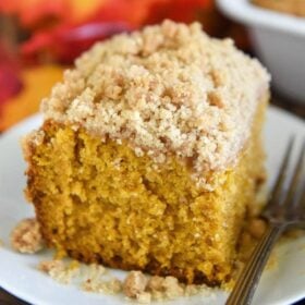 Pumpkin Sour Cream Coffee Cake: an extra moist pumpkin spice cake, topped with a cinnamon crumb topping, makes a perfect Fall breakfast coffee cake or dessert! #Pumpkin #CoffeeCake #Dessert #Cake