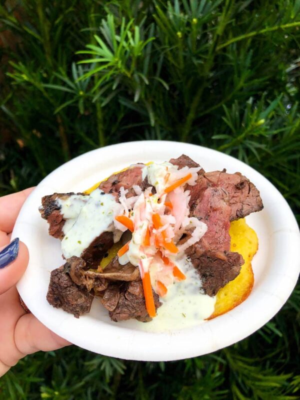 Charred Chimichurri Skirt Steak on a Smoked Corn Cake with Pickled Vegetable Slaw and Cilantro Aïoli at Epcot Food & Wine Festival 