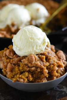 Pumpkin Pie Crisp: this easy fall dessert is made with a creamy pumpkin pie filling and a crunchy golden cinnamon streusel and then served warm with ice cream!