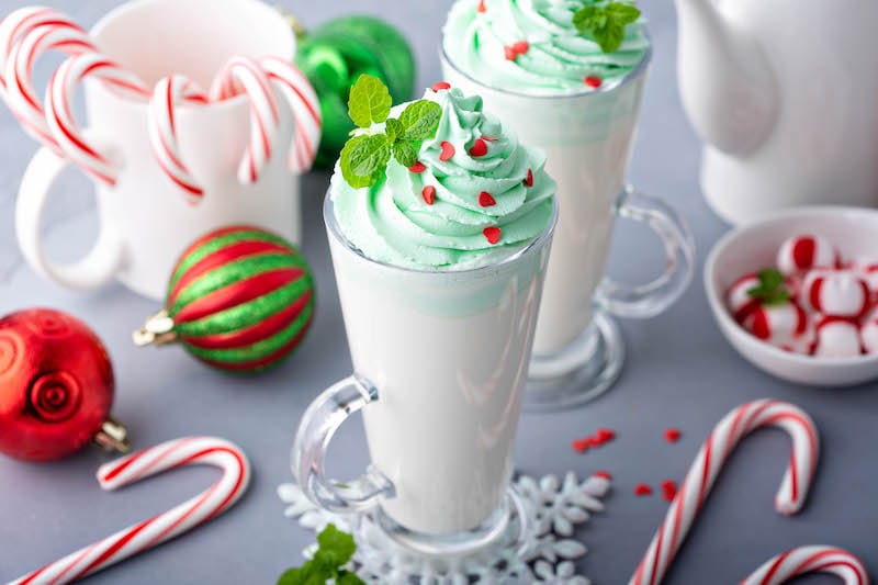 Peppermint hot chocolate with marshmallow and candy cane sweets in