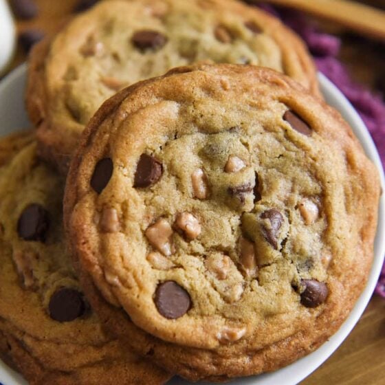 Heath Bar Cookies are a buttery, brown sugar cookie loaded with chocolate chips and toffee bits with thick, chewy centers and crispy edges! #HeathBarCookies #Cookies #HeathBar #Toffee #CookieRecipes