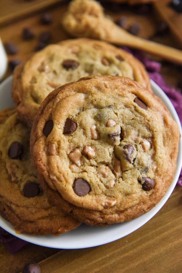 Heath Bar Cookies are a buttery, brown sugar cookie loaded with chocolate chips and toffee bits with thick, chewy centers and crispy edges! #HeathBarCookies #Cookies #HeathBar #Toffee #CookieRecipes