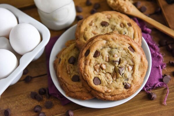 Heath Bar Cookies are a buttery, brown sugar cookie loaded with chocolate chips and toffee bits with thick, chewy centers and crispy edges! #HeathBarCookies #Cookies #HeathBar #Toffee #CookieRecipes