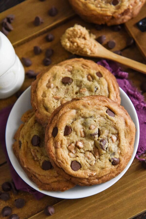 Heath Bar Cookies are a buttery, brown sugar cookie loaded with chocolate chips and toffee bits with thick, chewy centers and crispy edges! #HeathBarCookies #Cookies #HeathBar #Toffee #CookieRecipes