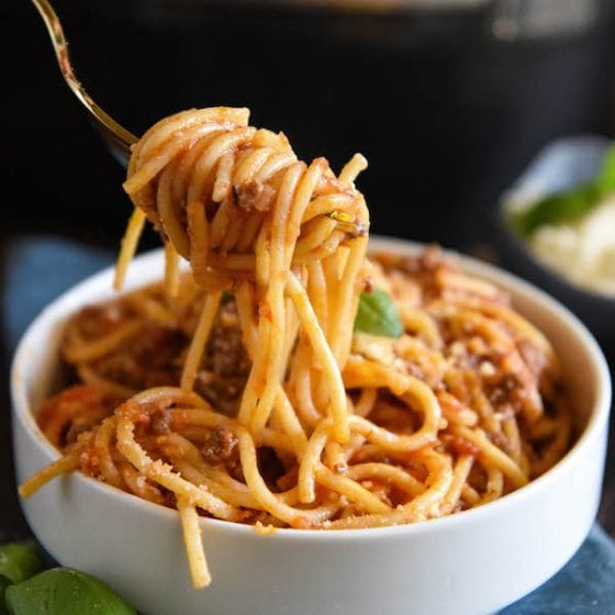 A big forkful of spaghetti bolognese.