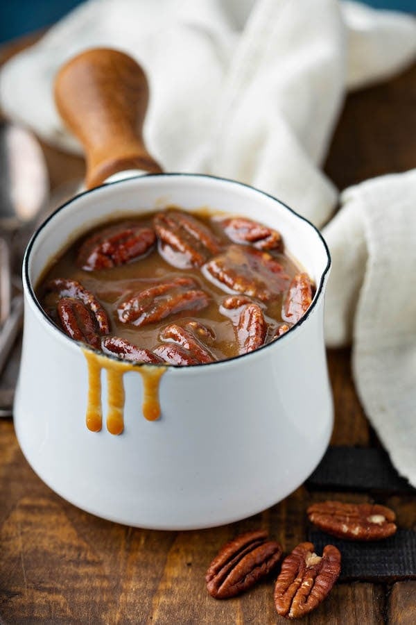 Pecan praline sauce in a sauce pan.