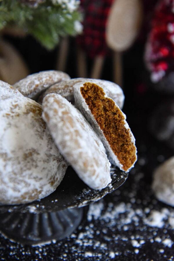 Pfeffernusse Cookies broken in half so you can see the inside. 