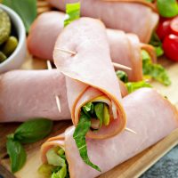 Cuban Ham Roll Ups: these low carb wraps include smoked ham, yellow mustard, dill pickles and shredded lettuce for an easy delicious make ahead lunch or snack! #CubanHamRollUps #HamRollUps #LowCarb #Keto #LowCarbRecipes #Lunch #Ham #LunchMeat #DeliMeat