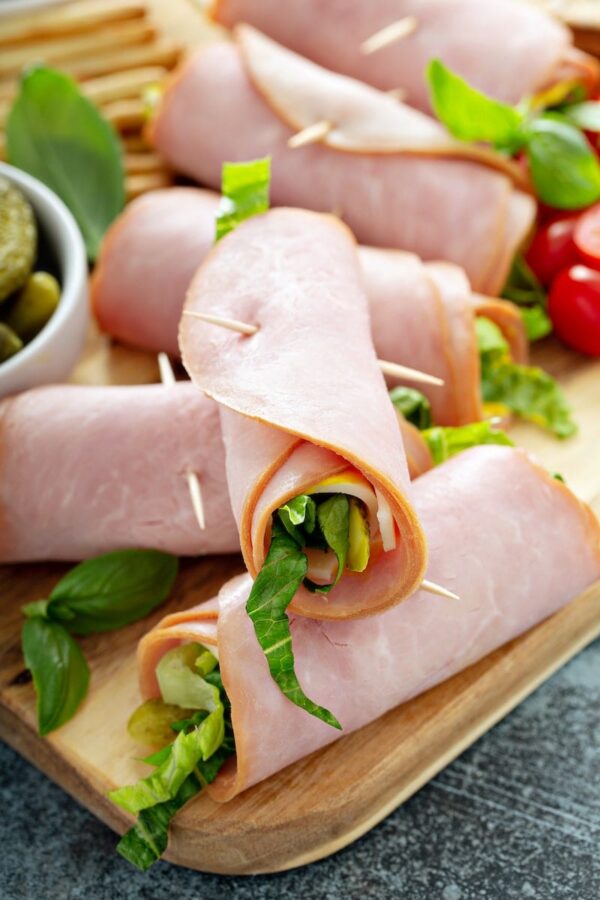 Cuban Ham Roll Ups: these low carb wraps include smoked ham, yellow mustard, dill pickles and shredded lettuce for an easy delicious make ahead lunch or snack! #CubanHamRollUps #HamRollUps #LowCarb #Keto #LowCarbRecipes #Lunch #Ham #LunchMeat #DeliMeat