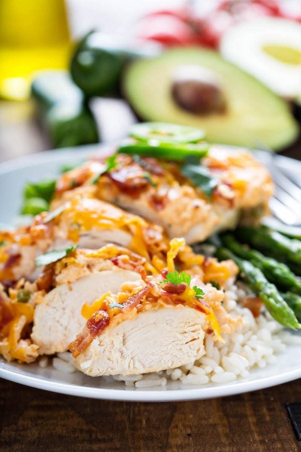 Jalapeno Popper Chicken cut into slices on a plate. 