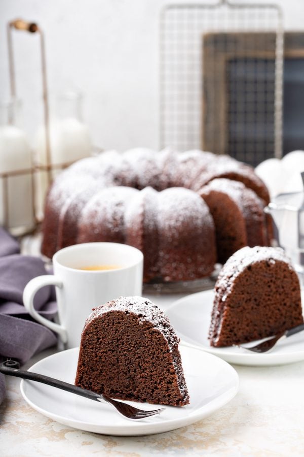 Slices of root beer pound cake on plates. 