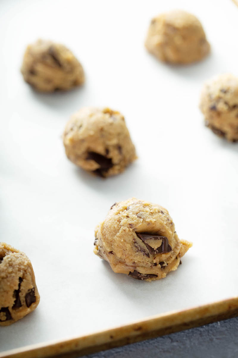 Chocolate Chunk Cookies dough balls on baking sheet