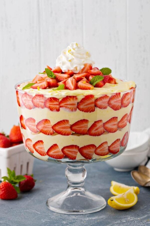 One large trifle bowl filled with a lemon strawberry trifle. 