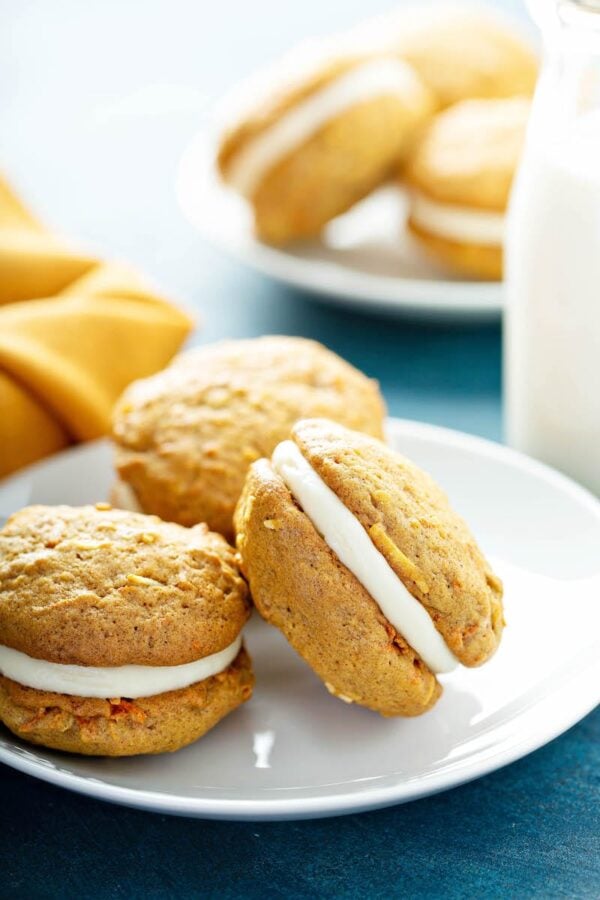 Carrot Cake Whoopie Pies with Cream Cheese Filling on a plate. 