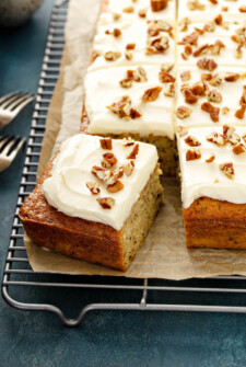 Banana Pecan Cake with a slice cut out of it.