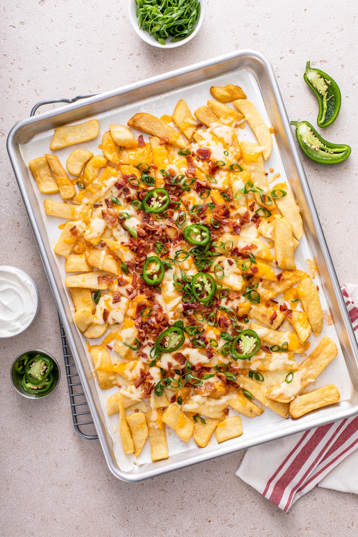 Baked fries with melted cheese, jalapeno, bacon, and green onion.