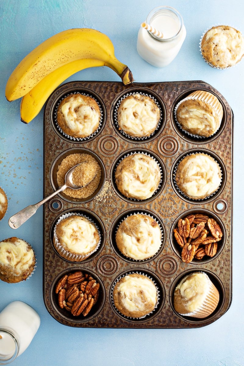 Banana Cream Cheese Muffins in a muffin tin.