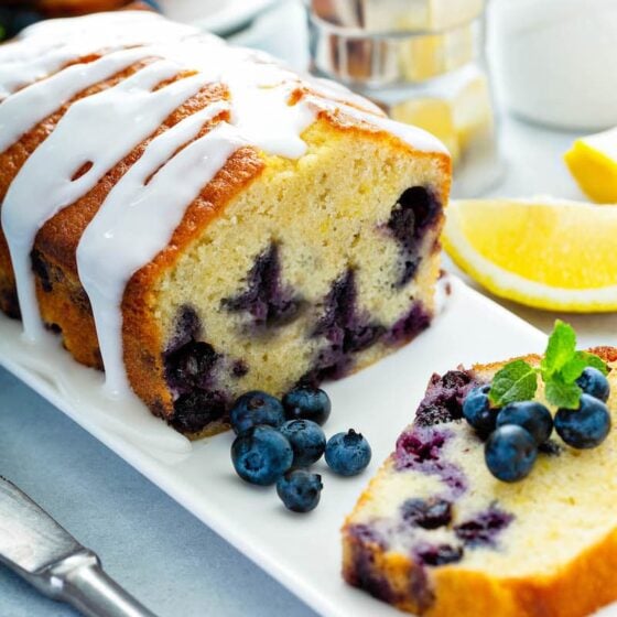 Blueberry Buttermilk Bread sliced on a plate.