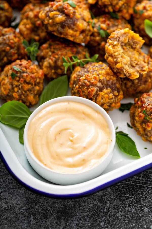 Creamy Sweet Chili Sauce in a bowl with sausage balls.